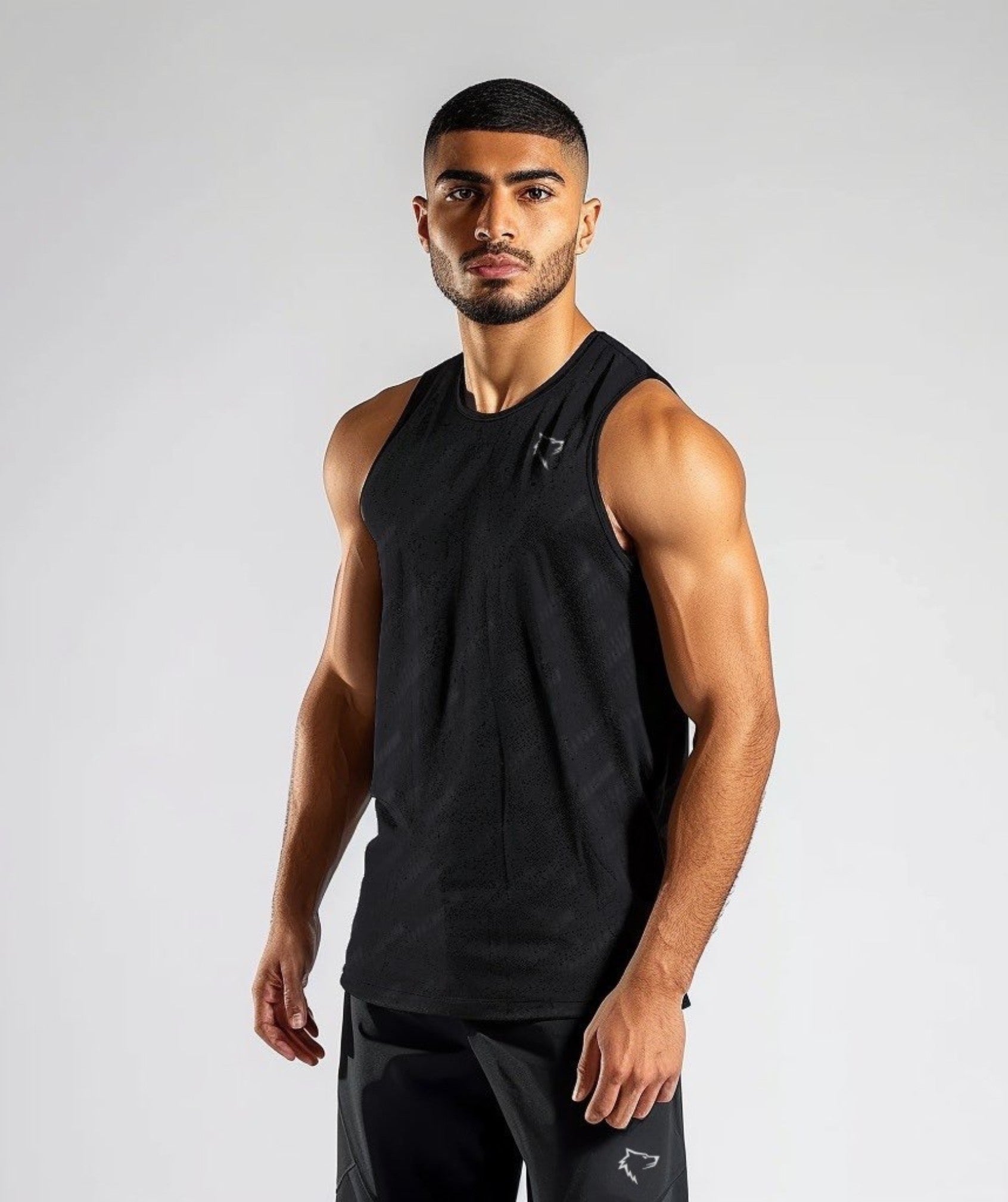 Apex™ black Flex Tank Top front view - eco-friendly and flexible top